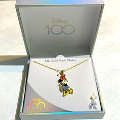 Disney 100 Year Anniversary Minnie Necklace 14k Gold Flash Plated, New In Box! Own A Piece Of Disney’s 100-Year Special Commemorative History! Wear It, Collect It, Or Display It! #Disney #Minniemouse #100year #Collectible #Promgift Gold Mickey Mouse Jewelry For Gift, Disney Gold Necklaces For Gifts, Gold Disney Necklace For Gift, Disney Gold Mickey Mouse Jewelry, Gold Disney Mickey Mouse Jewelry, Disney Mickey Mouse Gold Jewelry, Themed Mickey Mouse Jewelry As Gift, 100 Year Anniversary, Disney Gold