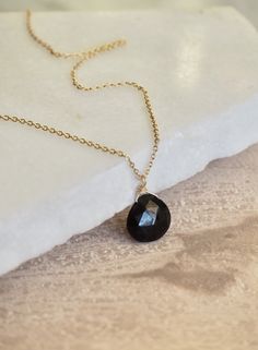 "Wire Wrapped Teardrop Onyx Necklace, Black Onyx Necklace, Genuine Black Onyx Necklace, July Birthstone Necklace, Gemstone Necklace, Gold Filled Necklace, Personalized Gift A simple 14 k gold filled necklace that is perfect for elegant everyday wear. The black onyx is facetted and has a discrete shine. About onyx: 🌿 Onyx is the birthstone for August and the Zodiac stone for Leo. 🌿 Onyx is the anniversary gemstone for the 7th year of marriage. Black Onyx is the anniversary gemstone for the 10th Zodiac Stones, Onyx Pendant, Black Onyx Necklace, Gold Filled Necklace, Necklace Rose Gold, Onyx Necklace, Teardrop Necklace, Necklace Gemstone, July Birthstone