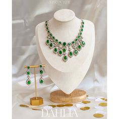 A contemporary spin-off on timeless classic rendered into striking neckpiece! Ornate into emerald stones and sparkling CZ stones designed in a unique and delicate manner to make you shine. The set includes a necklace that comes with an adjustable chain and a pair of earrings. Approximate earrings length is. Please click on the video for a detailed view of the product. Silver-plated on high-quality brass as base metal. In-stock & ready-to-ship. *Please Note: We use faux stones and beads in all of Heritage Jewellery, Waist Chain, Ruby Stone, Faux Stone, Emerald Stone, Head Accessories, Last Call, Stone Design, Cz Stone