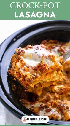 the crock pot lasagna is being lifted with a spatula