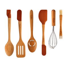 wooden kitchen utensils lined up in a row