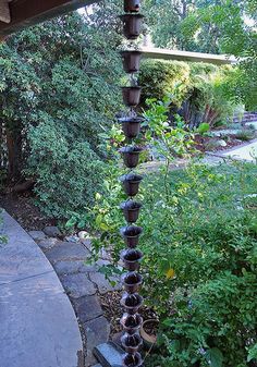 Rain Chain Iron Flower Cups Backyard Vibes, Outdoor Waterfall Fountain, Flower Cups, Landscaping Around House, Paver Tiles, How To Install Gutters, Rain Chains, Rain And Thunder, Water Drip