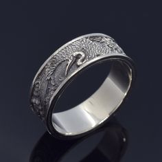 Japanese Crane Ring, Crane and Sun Ring, Japanese Bird Ring, Japanese Traditional Ornamental Ring. ArmenianJewelryHouse personnel do everything to complete the customer's safety and experience.  Item Details  - Material: 925 Sterling Silver - Weight ~ 9.50 Grams(Depending on size) - Gender: Male / Female - Finish: Oxidized Silver / Polished Silver - The product is handmade and its weight may vary up to 1.00 grams. - We recommend using the main photo version of the item(If there are any other opt Symbolic Carved Round Ring, Symbolic Carved Ring, Ceremonial Etched Ring Jewelry, Traditional Round Jewelry With Decorative Band, Artisan Etched Ring Jewelry, Unique Carved Round Rings, Traditional Jewelry Ring With Decorative Band, Ceremonial Etched Round Rings, Symbolic Rings With Decorative Band For Gifts