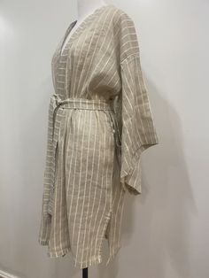 Special design light weight bat sleeve kimono robe. The ultimate in luxurious comfort, our superior linen kimono robe is as indulgent as it is beautiful. SPECIFICATION * Fabric: %85 linen and %15 cotton blend * Color : beige * Size : one size fits all, a loose cut kimono for Small / Medium / Large size women * Attributes : natural organic linen and cotton blend fabric, garment wash CARE INSTRUCTION * Machine Wash Warm and separately * Iron inside out and Warm * Dryclean You may order luxurious g Daywear Kaftan With Kimono Sleeves For Beachwear, Beachwear Kaftan With Kimono Sleeves For Daywear, Elegant Tunic Kimono For Summer, Elegant Tunic Kimono For Vacation, Elegant Open Front Kaftan For Beach, Elegant Long Vacation Robe, Daywear Kimono With Kimono Sleeves For Beach, Beachwear Kimono With Kimono Sleeves For Daywear, Beige Open Front Kimono For Beach