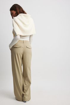 These suit pants feature a high waist fit. They have a wide leg design and side slant pockets. These suit pants feature back mock pockets with a flap detail. Wide-leg Cargo Pants For Work, Elegant Wide-leg Workwear Cargo Pants, Elegant Wide-leg Cargo Pants For Work, Elegant Wide Leg Cargo Pants For Workwear, Elegant Cargo Pants For Work In Fall, Classic Wide-leg Cargo Pants For Work, Chic Wide Leg Cargo Pants For Workwear, Chic Wide Leg Cargo Pants In A Specific Color, Chic High-waisted Cargo Pants For Work