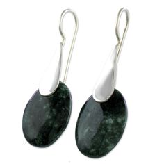 Dark green jade reveals verdant shadows, evoking the forest that surrounds the pyramids at Yaxha. Ruben and Gilda Perez set polished oval gems in modern sterling silver earrings. Sterling silver & jade Hook earrings High polish finish Handmade in & fairly traded from Guatemala Paw Print Jewelry, Ribbon Jewelry, Printed Jewelry, Flip Flop Shoes, Jade Jewelry, Modern Earrings, Jewelry Packaging, Hook Earrings, Jewelry Gift Box