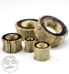 Awesome tamarind wooden concave tunnel plugs with sono wood inlay. Sizes / gauges available in 00G, 1/2", 9/16", 5/8", 3/4", 7/8", 1 Inch, 29mm, 32mm. Sold in pairs starting at $14/pair. Orders over $20 ship free Ear Tapers, Wooden Plugs, Gold Body Jewellery, Circular Barbell, Fake Plugs, Stone Plugs, Wood Plugs, Labret Piercing, Eyebrow Piercing