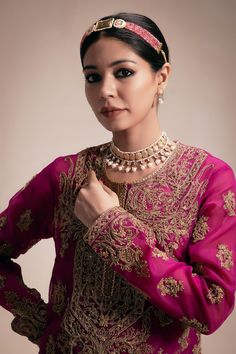 Magenta kurta with all over floral gold tone embroidery using sequins, beads, cutdana, thread. Paired with a floral brocade pant and inner slip. - Aza Fashions Elegant Sets With Gold Embroidery For Diwali, Gold Palazzo Set With Dabka Work, Traditional Gold Palazzo Set With Intricate Embroidery, Gold Embroidered Palazzo Set For Diwali, Gold Embroidered Palazzo Set For Transitional Season, Kundan Choli With Gold Embroidery For Eid, Diwali Sharara With Gold Embroidery And Kundan, Elegant Anarkali Set With Gold Embroidery, Elegant Sharara With Gold Embroidery For Festivals