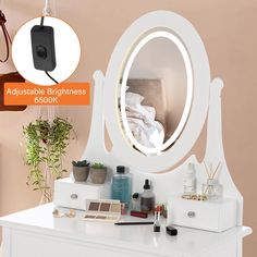 an image of a white vanity with mirror and lights on it's side table