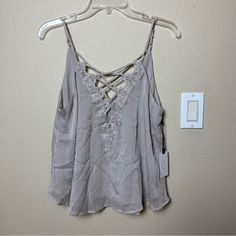 Astr The Label Lace Crisscross Sparkle Cami Size M Nwt Color: Taupe Purchased At Nordstrom Spring V-neck Tops With Crisscross Straps, Spring V-neck Tank Top With Crisscross Straps, V-neck Tank Top With Crisscross Straps For Spring, Spring Cross-back Tops For Day Out, Spring Cross Back Top For Day Out, Summer Cross-back Cross-tied Top, Cross Back Top For Day Out In Spring, Summer Cross-tied Cross Back Top, Summer Cross-tied Cross-back Top