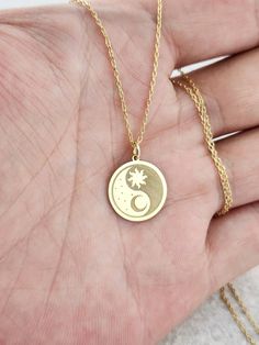 14K Solid Gold Yin Yang Moon and Star Necklace, Ying Yang Pendant, Yin Yang Jewelry, Chakra Necklace, Dainty Yin  Yang with  Moon and Star Pendant 14 Material of pendant: Solid gold 14k ♣ Metal Stamp: 14k ♣The pendant is available in 3 sizes: 12.7 / 0,50 inches ( Diameter ) 15.2 mm / 0,60 inches ( Diameter ) 19,1 mm / 0,75 inches ( Diameter ) ( In the photos the size of the pendant is 15mm / 0.55 inches Diameter ) ♣ Material of chain: Solid gold 14k  Chain Length: ♥40 cm / 15,75 inches ( Length Yin Yang Pendant, Symbolic Sun And Moon Star Jewelry, Yin Yang Jewelry, Afro Jewelry, Moon And Star Pendant, Moon And Star Necklace, Masc Outfits, Chakra Necklace, Moon And Star