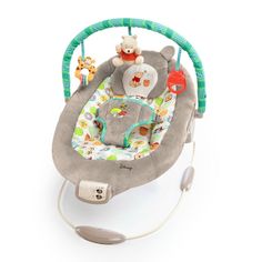 a baby's swing that is attached to a cord and has stuffed animals on it