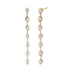 Finely crafted from 18K Gold with glittering, hand-selected diamonds along a sleek, elegant line drop silhouette, these diamond earrings are the perfect statement piece for any look. Enhance your collection with 3.36ct of pure luxury. Elegant Long Drop Diamond White Earrings, Elegant Long Drop Diamond White Diamond Earrings, Elegant Long Drop Diamond Earrings With Prong Setting, Elegant Diamond White Linear Earrings With Prong Setting, Formal Long Drop Diamond Linear Earrings, Formal Long Drop Diamond White Earrings, Formal Long Drop Diamond White Diamond Earrings, Elegant Linear Diamond Cut Earrings For Formal Occasions, Elegant Long Drop Diamond Earrings For Evening