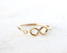 Knotted Ring Gold-Filled | Etsy Adjustable Infinity Stackable Rings For Anniversary, Adjustable Infinity Stackable Anniversary Rings, Gold Infinity Promise Jewelry, Infinity Shape Stackable Fine Jewelry Rings As Gift, Fine Jewelry Infinity Stackable Rings As Gift, Fine Jewelry Stackable Infinity Rings As Gift, Gold Infinity Stackable Rings For Wedding, Dainty Gold Infinity Stackable Rings, Gold Infinity Ring As Gift