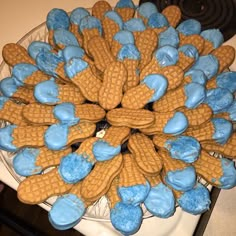 a cake made to look like waffles with blue icing on top and chocolate chips in the middle