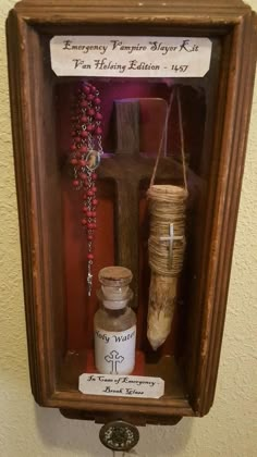 an old wooden box with some items in it