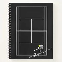 a notebook with a tennis racket and ball on it