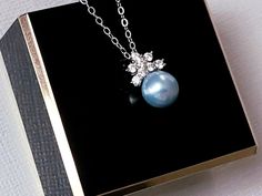 Wedding Light Blue Pearl Sterling Silver Cubic Zirconia Dainty Bridal Pendant Necklace with .925 Sterling Silver Chain. CHAIN is 18 inches (45.7cm) long. PENDANT is about 0.55 inch (1.4cm) long including bail. BRIDAL NECKLACES SECTION: https://www.etsy.com/shop/LanaChayka?ref=seller-platform-mcnav§ion_id=11638944 JEWELRY SETS SECTION: https://www.etsy.com/shop/LanaChayka?ref=seller-platform-mcnav§ion_id=18873488 BRIDAL JEWELRY SETS SECTION: https://www.etsy.com/shop/LanaChayka?ref=seller-platfor Blue Pendant Jewelry With Pearl, Formal Blue Necklace With Pearl Pendant, Blue Pearl Pendant Jewelry For Wedding, Elegant Blue Pearl Pendant Necklace, Blue Polished Pearl Necklace, Wedding Light Blue, Bridal Pendant Necklace, Wedding Something Blue, Champagne Jewelry