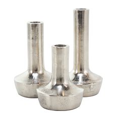 three stainless steel vases sitting side by side on a white background, one is turned upside down