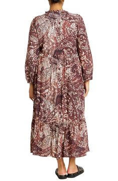 Add some elegance to your next dinner-date look in this flowy, tiered maxi dress that's trimmed with dainty ruffles and covered in a beautiful boho-inspired print. 52" length Slips on over head V-neck Long sleeves with elastic cuffs Unlined 100% viscose Machine wash, line dry Imported Safari Dress, Sheer Maxi Dress, A Line Maxi Dress, Long Sleeved Dress, Short Sleeve Maxi Dresses, Maxi Shirt Dress, Sleeved Dress, Tiered Maxi Dress, Maxi Dress With Sleeves