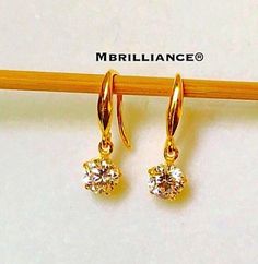 Solid 22k gold Dangling double Cz stones earrings 916 Gold Metal Gold Purity : 916 GOLD Stones : cubic zirconia (CZ stones) Weight : 2.10-2.20 grams hallmark : 916 stamp Appx Size : see pic with ruler Colour : YELLOW gold Hallmark : Hallmarked 916 Design : Elegant & beautiful cz stones dangling earrings. Brandnew genuine authentic 22k solid gold / 916 gold Luxury 22k Yellow Gold Chandbalis, Luxury 22k Gold Elegant Chandbalis, Luxury Gold Dangle Chandbalis, Gold Bridal Earrings With Brilliant Cut Dangle, Dazzling Hand Set Gold Earrings, Gold American Diamond Earrings For Anniversary, Gold Cubic Zirconia Danglers For Formal Occasions, Gold Cubic Zirconia Dangle Earrings, Gold Cubic Zirconia Danglers For Formal Events