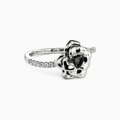 To lend yourself a touch of elegance with this charming rose ring. It features a graceful rose in precious metal tightly embraces a triangle-cut center stone. Setting on a paved band with a unique curve, this lovely piece will reveal the deep romance inside your heart.Carat Weight: 0.3 ctStone Size: 4*4 mmStone Type: Moissanite/GemstoneNumber of Stones: 1 Stone Shape: TrillionStone Color: OptionalCarat Weight: 0.112 ctStone Size: 1.2 mmStone Type: Moissanite/GemstoneNumber of Stones: 14 Stone Sh Side Stone Engagement Ring, Rose Ring, Stone Engagement Ring, Stone Setting, Stone Engagement, Precious Metal, Precious Metals, Personalized Jewelry, Engagement Ring