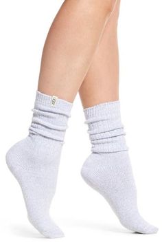 Soft, stretchy ribbed socks have a cozy slouchy fit through the ankles and reinforced heels and toes for durability. Polyester/spandex Machine wash, tumble dry Imported Women's Clothing Sock Inspiration, How To Wear Uggs, Sparkle Uggs, Ugg Socks, Sparkle Socks, Frilly Socks, Ugg Winter Boots, Ribbed Socks, Short Rain Boots