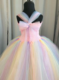 Whimsical Rainbow Princess Dress For Dress-up, Multicolor Fairy Dress For Dress-up, Pink Sleeveless Fairy Dress For Costume Party, Pink Fitted Princess Fairy Dress, Fitted Multicolor Tutu Dress With Ruffles, Rainbow Princess Dress With Ruffles, Princess Style Rainbow Dress With Ruffles, Princess Style Multicolor Fairy Dress With Ruffles, Playful Pink Tulle Princess Dress