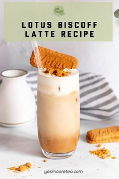 a glass filled with ice cream and topped with an orange biscuit next to cookies