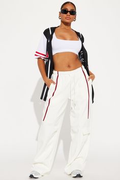 Available In Black/White And Cream/combo. Jogger Pant Elastic Waistband High Rise Drawstring Hand Pockets Cargo Pocket Stripe Stretch Wide Leg Adjustable Toggler Hem 30" Inseam Main Fabric: 100% Polyester Imported | Street Vibe Wide Leg Jogger Pant in Cream size Large by Fashion Nova Sporty White Cargo Pants With Elastic Waistband, White Stretch High Waist Cargo Pants, Sporty White Wide Leg Cargo Pants, High Waist White Cargo Pants For Streetwear, White High Waist Cargo Pants For Streetwear, White Cargo Pants With Elastic Waistband For Streetwear, White Cargo Pants With Elastic Waistband, Sporty White Cotton Cargo Pants, New Mexico Outfits