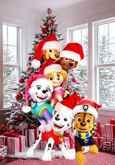 a christmas tree with many stuffed animals around it