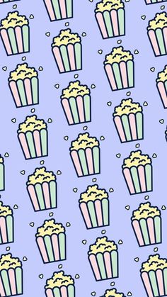 a blue and pink background with cupcakes on it