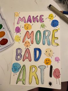 the words make more bad art are drawn on paper