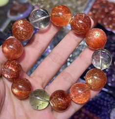 Material:  Arusha sunstone beads  size : Approx 17mm Due to manual measurement, there may be 0.5-1mm errors, thank you hole size 1mm   quantity: one strand  6mm approx 29 pcs one strands 7mm approx25 pcs one strands 8mm approx 22 pcs one strands 9mm approx 21pcs one strands 10mm approx 19 pcs one strands 11mm approx 18pcs one strands 12mm approx 16 pcs one strands 13mm approx 16 pcs one strands 14mm approx 15 pcs one strands 15mm approx 14pcs one strands 16mm approx 14 pcs one strands 17mm appro Arusha, Women Bracelet, Beads Bracelet, Bracelet Jewelry, Colour Tone, Natural Crystals, Womens Bracelets, Beaded Bracelet, Jewelry Gifts