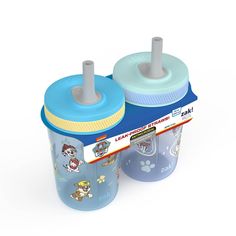 two children's sippy cups sitting next to each other