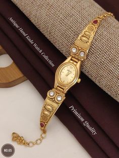 Description :- Gold-Tone Watch, Oval Face Watch For Women, gift for her, Vintage Style watches, Elegant Watches, Fashion dress watch, Minimalist Watch Gift yourself a royal look with this perfectly crafted kundan necklace set from Manalisstudio. Crafted with high quality, it is impressive in design. The green enamel artwork adds perfect texture to the design. Perfect for weddings and festivities, this antique necklace set should be put on with your favorite sari or lehenga. 100% Satisfaction. Lo Gold Oval Watches As Gifts, Oval Gold Watches For Gifts, Gold Oval Watches For Gift, Minimalist Watch, Oval Faces, Kundan Necklaces, Dress Watch, Antique Necklace, Watch Gifts