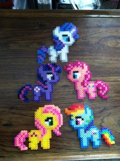 several different types of pony beads on a table