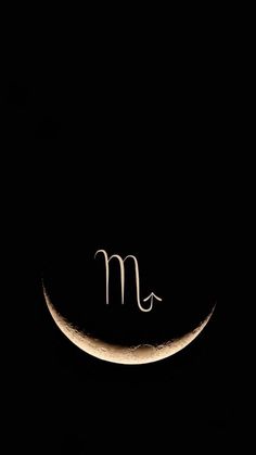 the moon is in the dark with writing on it