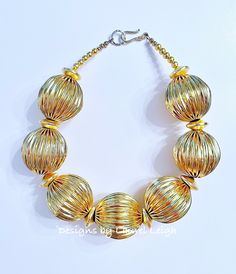 Chunky Textured Gold Bead Statement Necklace - Chinoiserie jewelry Gold Metal Necklace With Polished Beads, Gold Metal Jewelry With Faceted Beads, Gold Beaded Necklace With Large Beads For Festive Occasion, Gold Necklace With Polished Metal Beads, Gold Beaded Necklaces With Large Beads For Party, Festive Gold Metal Beaded Necklaces, Festive Gold Beaded Metal Necklace, Gold Metal Beaded Necklaces With Faceted Beads, Gold Brass Beaded Necklace With Round Beads