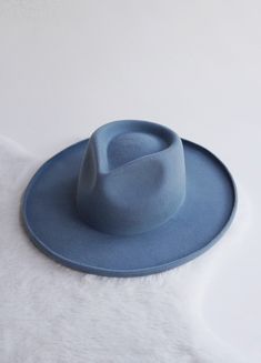 Inspired by the unique blues of Laguna. 100% Australian wool, rolled pencil brim, and teardrop crown. Lined with luxury satin. Stiffened wool to retain shape and last a lifetime of adventure.  Adjustable- Velcro drawstrings under interior band. To perfect/downsize the fit up to 2cm. Brim- 9 cm Height-  10.5 cm Structure- Stiff Head Types, Womens Fedora Hat, Laguna Blue, Womens Fedora, Fedora Hat Women, Beaded Hat, Brimmed Hat, Boater Hat, Leather Hats