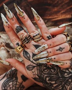 ✨Gold stacking✨ Nail and ring appreciation, my favourite kind of post. I've been after a buckle ring for a while now and @baptistldn sent me this beautiful gold piece to add to my collection. It does also come in silver btw 👀 Nails by @customclawsbyrhianna The queen of gothic cathedral nails 🙏 should we do....more 👀 *Gifted Statue Of Liberty Nails, Rennaisance Nails, Nails With Rings In Them, Viking Acrylic Nails, Elden Ring Nails, Cruel Prince Nails, Filigree Nails, Gawdy Nails, Dagger Nail Art