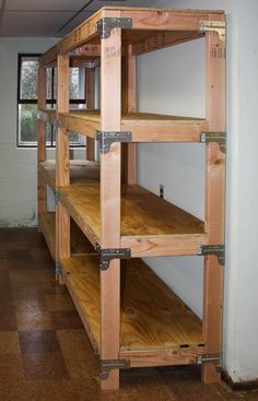 the shelves are made out of wood and have metal brackets on each side to hold items