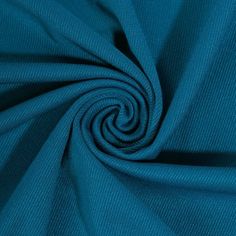 a close up shot of a blue fabric