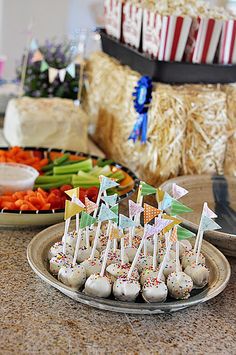 there are many desserts on the table ready to be eaten at this birthday party