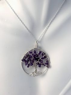 "In Bloom Amethyst Sterling Silver Tree Of Life Necklace On Sterling Chain Wire Wrapped Pendant Gemstone Jewelry February Birthstone by The Twisted Tree of Life Ready To Ship:  You will receive the exact pendant pictured. The design for sale is a In Bloom Amethyst Tree of Life with Sterling Silver Wire Wrapped Handcrafted Wire Frame and will bring delight to the person wearing it.  It  measures 1.5\" wide.  All my handmade trees vary a little bit - they are individual trees with uniqueness of th Tree Of, Twisted Tree, Sterling Silver Wire Wrap, Silver Tree, Tree Of Life Necklace, Jewelry Wire, Tree Of Life Pendant, Wire Frame, February Birthstone