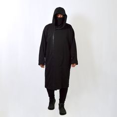 Very cool and comfortable unisex long hooded oversized coat with full zipper. Nice dense french terry fabric makes it cozy. It goes well with streetwear, gothic, punk, cyberpunk, militari, ninja, post-apocalyptic, jedi or sith styles, as easily as it fits in everyday wear. IMPORTANT! We can make a warmer version of the fabric with a fleece inside. If you want one, write to us. * 70% Cotton/ 30% Polyester. * Oversize. * Air-jet spun yarn with a soft feel and reduced pilling. * Strong overlock sea Urban Oversized Parka For Streetwear, Oversized Parka With Drawstring Hood For Streetwear, Oversized Streetwear Parka With Double-lined Hood, Black Oversized Techwear Parka, Oversized Black Techwear Parka, Oversized Hooded Parka For Streetwear, Oversized Parka With Detachable Hood For Streetwear, Oversized Urban Parka With Double-lined Hood, Urban Oversized Outerwear With Adjustable Hood