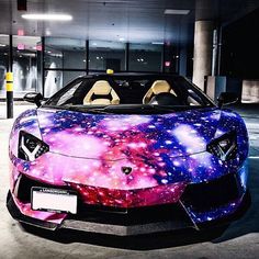 a car that has been painted with galaxy