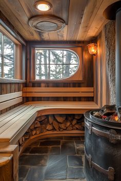 a wooden bench sitting next to a window in a room with stone floors and walls