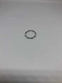 Hand made in Brooklyn NY Micro band ring All pave set Cubic Zirconia in Rhodium Sterling Silver to prevent tarnish Size 7 Can be re sized for a $10 fee PLEASE add ring size to notes in your order!! Thanks. All rings are shipped in a nice gift box. Check out our over a THOUSAND great reviews Engraving is $4 per letter and is not always perfect depending on the piece. It can take a few days if the jeweler is busy. This is payable to Paypal Judithsltd@gmail.com Silver Cubic Zirconia Chain Ring Fine Jewelry, Silver Stackable Eternity Band, Silver Cubic Zirconia Stackable Rings With Half Eternity, Stackable Cubic Zirconia Eternity Band, Silver Hoop Rings With Prong Setting, Stackable Diamond Chain Ring, Silver Diamond Chain Ring For Anniversary, Hypoallergenic Silver Cubic Zirconia Ring, Stackable Cubic Zirconia Crystal Ring With Round Band