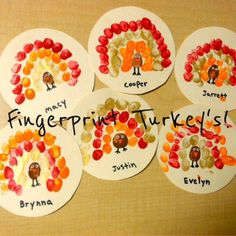 four turkey fingerprints with the names of each individual child's name on them